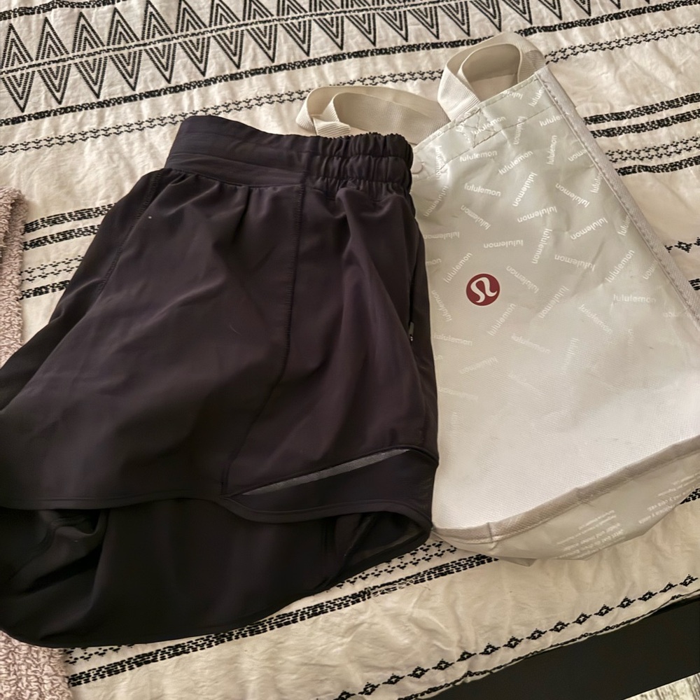 Lulu lemon hottie hot shorts 4” size 8. Black. Comes with bag! - Picture 5 of 6